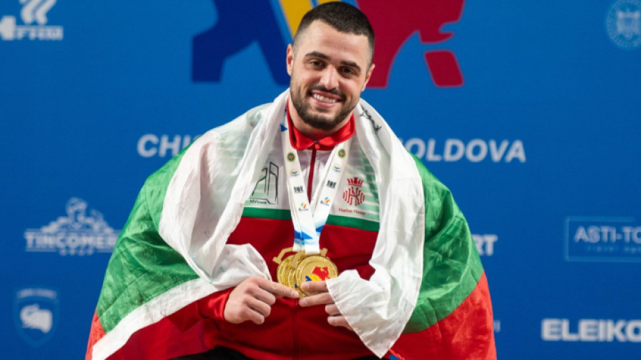 Karlos Nasar with gold medals and the Bulgarian flag